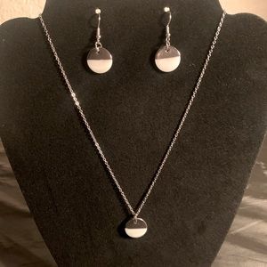 Silver and white earring and necklace set.